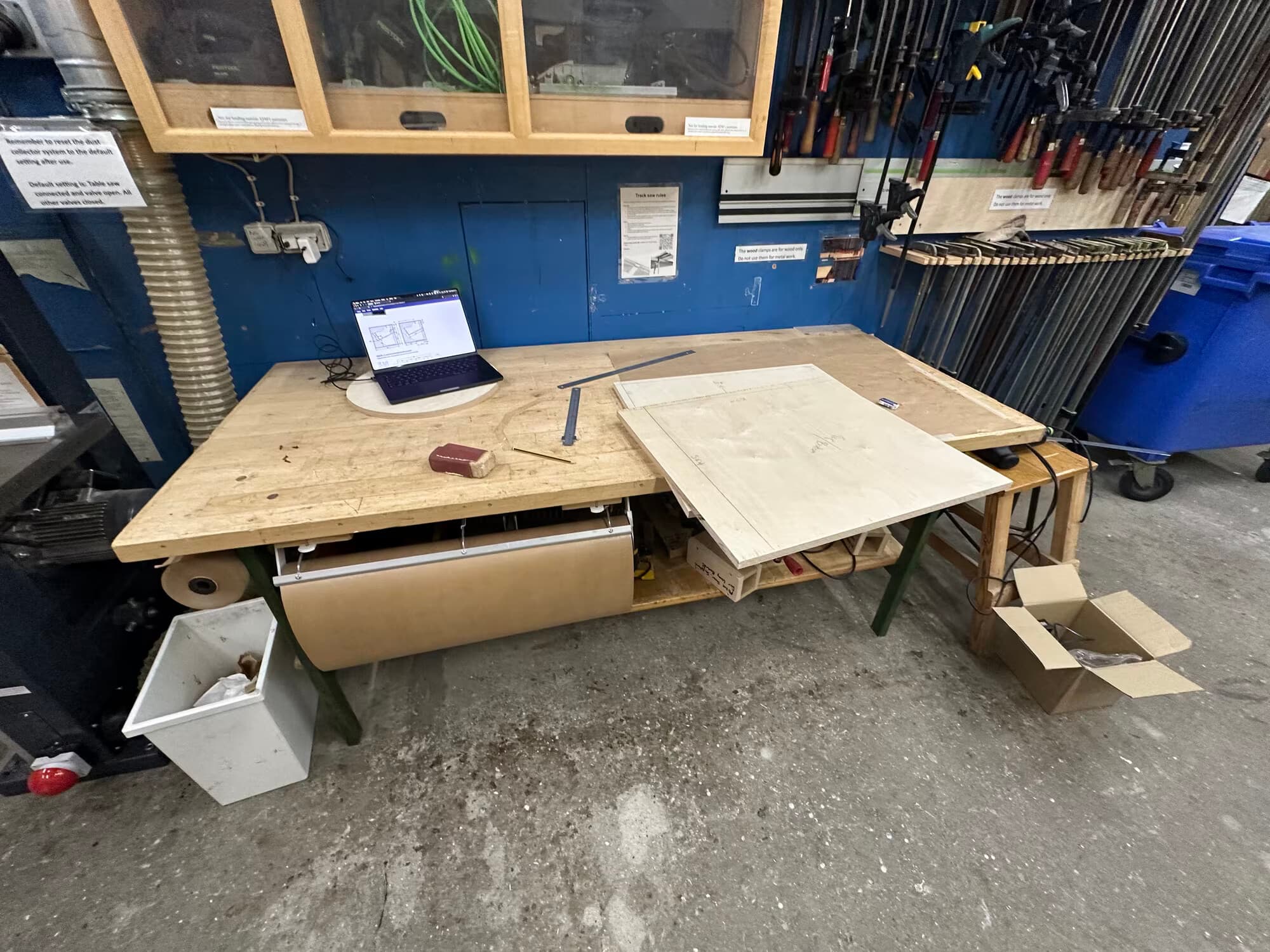 Cutting plywood panels to size on a workshop panel saw